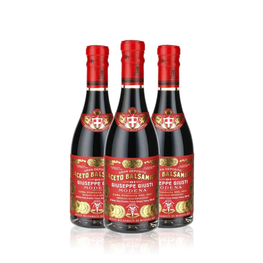 Drei Flaschen Giuseppe Giusti Aceto Balsamico Modena.