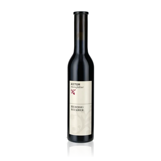 Acetum Manufaktur Bockbieressig Flasche vor weißem Hintergrund.