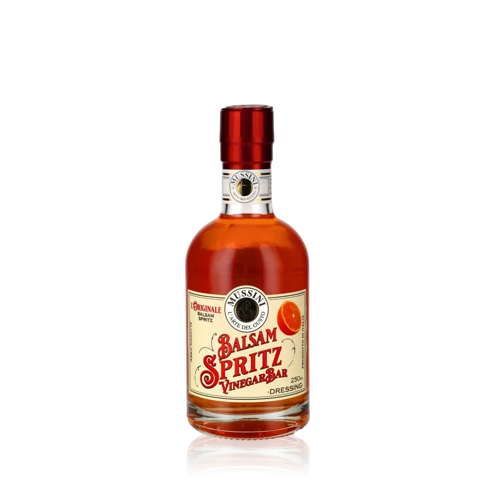 Mussini Balsam Spritz Vinegar Bar Flasche vor schwarzem Hintergrund.