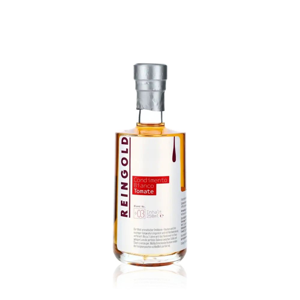 Reingold Condimento Bianco Tomate Flasche vor schwarzem Hintergrund.